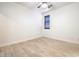 Bedroom with hardwood floors, neutral walls, and one window at 5396 Splendido Ave, Pahrump, NV 89061