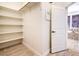 Bright closet with shelving near bathroom, great for storage at 5396 Splendido Ave, Pahrump, NV 89061