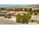 Charming single-story home with desert landscaping, paved driveway, and a tile roof at 5396 Splendido Ave, Pahrump, NV 89061