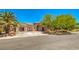 Charming single-story home featuring desert landscaping, a tile roof, and double door entry at 5396 Splendido Ave, Pahrump, NV 89061