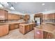 Spacious kitchen with stainless steel appliances, granite countertops, and ample cabinet space at 5396 Splendido Ave, Pahrump, NV 89061