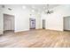 Large living room with tile flooring, recessed lighting, and many windows for lots of natural light at 5396 Splendido Ave, Pahrump, NV 89061