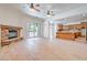 Open floorplan, with living room, kitchen and views of the backyard pool through the sliding glass doors at 5396 Splendido Ave, Pahrump, NV 89061