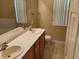 Bathroom featuring a double sink vanity with tiled floors, neutral walls, and a mirror at 5605 Midnight Breeze St, North Las Vegas, NV 89081