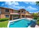 Inviting backyard pool with seating area, perfect for outdoor entertaining at 5619 Shadow Bend Dr, Las Vegas, NV 89135