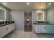 Beautiful bathroom with dual vanities, and stunning walk-in shower at 5619 Shadow Bend Dr, Las Vegas, NV 89135