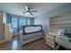 bedroom with light blue walls and a ceiling fan at 5619 Shadow Bend Dr, Las Vegas, NV 89135