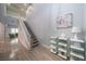 Bright foyer with high ceilings, elegant staircase, and stylish decor at 5619 Shadow Bend Dr, Las Vegas, NV 89135