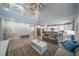 Open-concept living room featuring high ceilings and a seamless flow to the kitchen at 5619 Shadow Bend Dr, Las Vegas, NV 89135