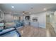 Spacious main bedroom boasts wood-look floors, ceiling fan, and access to outdoor balcony at 5619 Shadow Bend Dr, Las Vegas, NV 89135