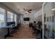 Bright office area with dual workstations, offering ample space and natural light at 5619 Shadow Bend Dr, Las Vegas, NV 89135