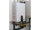 Indoor shot of a plumbed in water heater, located against the wall at 5619 Shadow Bend Dr, Las Vegas, NV 89135
