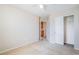 Bedroom featuring neutral carpet, a closet with sliding doors, and white trim at 5641 Vassar Meadow St, Las Vegas, NV 89148