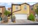 Charming two-story home with a two-car garage and well-maintained landscaping at 5641 Vassar Meadow St, Las Vegas, NV 89148