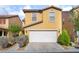 Charming two-story home with a two-car garage and well-maintained landscaping at 5641 Vassar Meadow St, Las Vegas, NV 89148