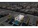 This aerial view showcases a lovely home surrounded by a vibrant community, complete with a two-car garage at 5667 Foxglove Field St, Las Vegas, NV 89130