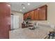 Well-equipped kitchen featuring granite counters, stainless steel appliances, and ample cabinet space at 5667 Foxglove Field St, Las Vegas, NV 89130