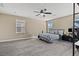 Main bedroom boasts natural light and ceiling fan, creating a serene atmosphere at 5667 Foxglove Field St, Las Vegas, NV 89130