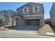 Charming two-story home featuring a spacious two-car garage and neutral color palette at 5736 Remy Rain St, Las Vegas, NV 89148