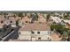 A neighborhood of residential townhomes with tree-lined streets and well-kept landscaping at 6170 E Sahara Ave # 1076, Las Vegas, NV 89142