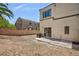 Backyard with a block wall, an air conditioning unit, and views of neighboring buildings at 6170 E Sahara Ave # 1076, Las Vegas, NV 89142