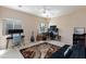 Bedroom with multiple workstations and a large area rug at 6170 E Sahara Ave # 1076, Las Vegas, NV 89142