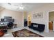 Inviting bedroom features a ceiling fan, desk, and a comfortable futon with decorative pillows at 6170 E Sahara Ave # 1076, Las Vegas, NV 89142