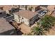 A townhouse with a desert landscaped backyard, privacy fence, and mature palm trees at 6170 E Sahara Ave # 1076, Las Vegas, NV 89142