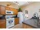 Efficient kitchen featuring modern appliances, granite countertops, and ample cabinet space at 6170 E Sahara Ave # 1076, Las Vegas, NV 89142