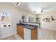 Bright kitchen area with stainless steel appliances and view into the dining area at 6170 E Sahara Ave # 1076, Las Vegas, NV 89142
