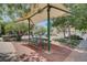 Community picnic area features covered seating, and lush landscaping at 6953 Graceful Cloud, Henderson, NV 89011