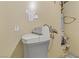 Water softener and water heater inside utility area at 6953 Graceful Cloud, Henderson, NV 89011