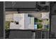 Expansive aerial view of a single-Gathering home featuring a private yard with lush landscaping, a gazebo, and a large patio at 7036 Winstar St, Las Vegas, NV 89131
