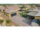 Aerial view showcasing the backyard layout featuring a pool, detached garage, gazebo, and landscaped areas at 7036 Winstar St, Las Vegas, NV 89131