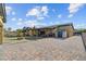 Expansive backyard boasts a large patio, well-maintained lawn, and ample space for outdoor activities at 7036 Winstar St, Las Vegas, NV 89131