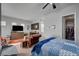 Open floor plan with bed, seating area, kitchenette, closet and bath access at 7036 Winstar St, Las Vegas, NV 89131