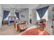 Spacious bedroom with sitting area, stylish curtains, and large bed at 7036 Winstar St, Las Vegas, NV 89131