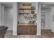 Custom coffee bar and beverage station with decorative shelves and coffee-themed decor at 7036 Winstar St, Las Vegas, NV 89131