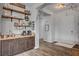 Custom coffee bar and beverage station with decorative shelves and coffee-themed decor at 7036 Winstar St, Las Vegas, NV 89131