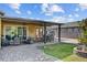Inviting covered patio with ceiling fans and comfortable seating, perfect for outdoor relaxation at 7036 Winstar St, Las Vegas, NV 89131