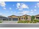 Charming single-story home with a two-car garage and manicured landscaping at 7036 Winstar St, Las Vegas, NV 89131