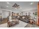 Elegant living room features recessed lighting, tile flooring, and contemporary decor at 7036 Winstar St, Las Vegas, NV 89131