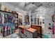 Spacious walk-in closet with custom shelving, hanging rods, and dressing space at 7036 Winstar St, Las Vegas, NV 89131