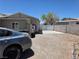 Backyard area featuring a driveway and a fence at 7108 Moon Ct, Las Vegas, NV 89145
