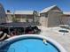 Backyard area showcasing trampoline, pool, sheds, and a swing set at 7108 Moon Ct, Las Vegas, NV 89145