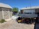 Backyard featuring a shed, a garage, and a trampoline at 7108 Moon Ct, Las Vegas, NV 89145