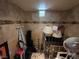Basement with concrete walls, a small window and tile accents at 7108 Moon Ct, Las Vegas, NV 89145