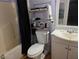 Small bathroom with a tub/shower combination and an over-the-toilet storage rack at 7108 Moon Ct, Las Vegas, NV 89145