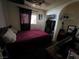 Bedroom featuring a bed, window with curtains, closet and other items in the room at 7108 Moon Ct, Las Vegas, NV 89145