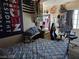 Bedroom featuring a bed with blue and white pattern bedspread and dark bedding at 7108 Moon Ct, Las Vegas, NV 89145